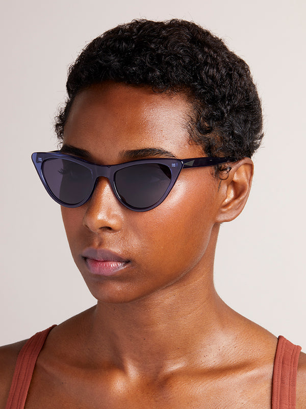 ST LOUIS - Dark Blue. ST LOUIS - Dark Blue. Modern take on 50s cat-eye classic. Suitable for a more narrow face w/ their soft tips and rounded edges. Available in sunglasses and opticals.