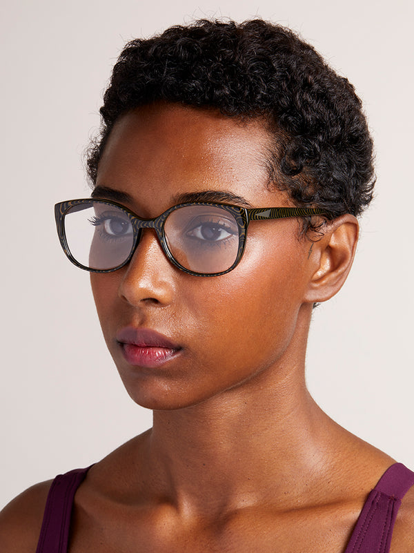 The frame is futuristic yet simple, lightweight medium to small style size - w/ rounded edges make it suitable for all face shapes. 