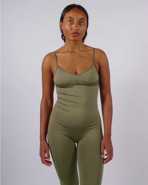 Model wears BALANCED unitard - Olive - PRISM² - plus size unitard -  Compression unitard - maternity playsuit - sculpting compression playsuit