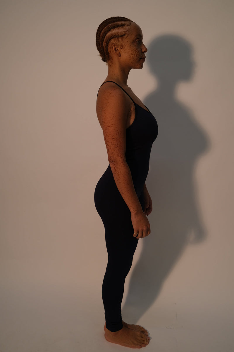 Model wears BALANCED - Black - PRISM² - black unitard - plus size unitard -  maternity playsuit - Unitard gym wear -  Compression unitard