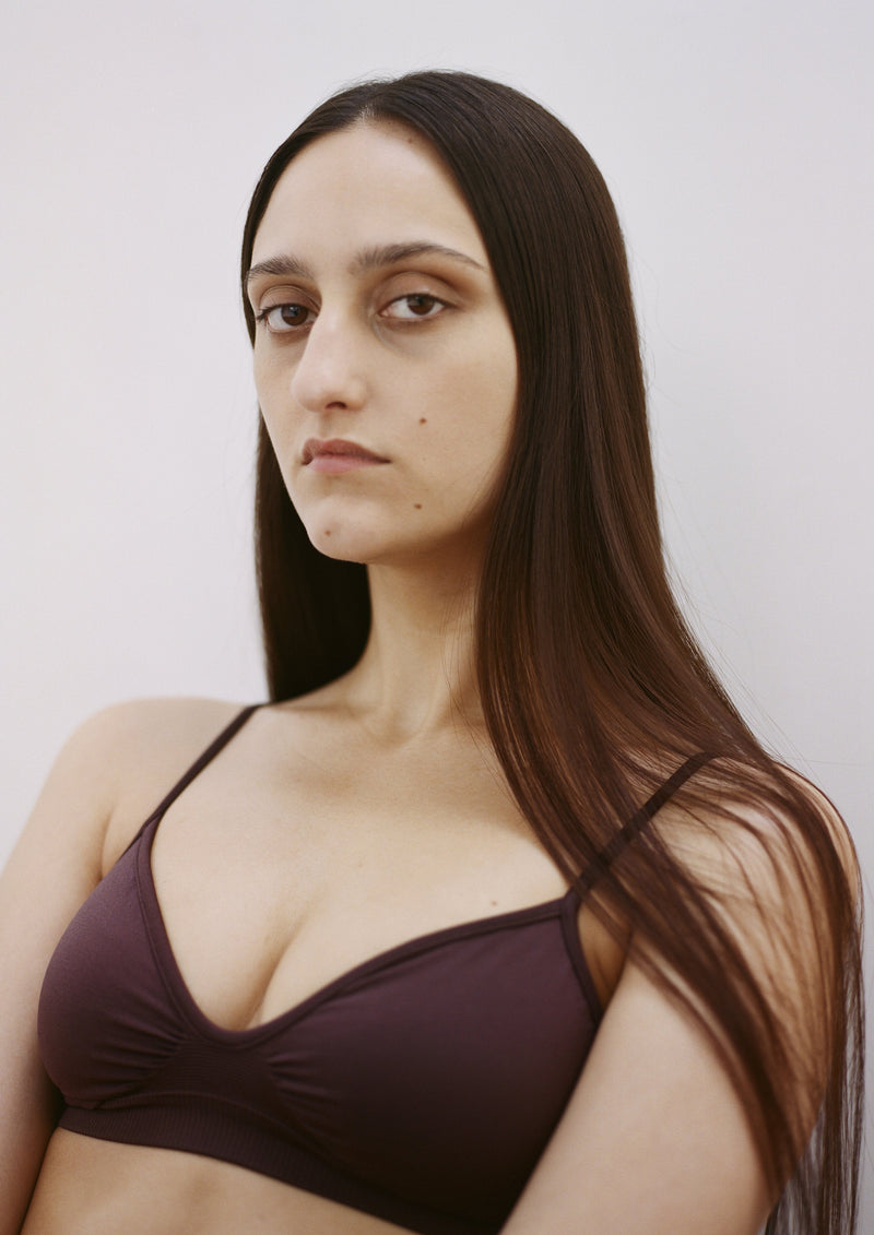 model wears liberated in chocolate brown - PRISM² - Bra for bigger breasts - Bra for smaller breasts - Gym bralette - Maternity bra top - Plus size bra - Soft bralete - supportive bra top