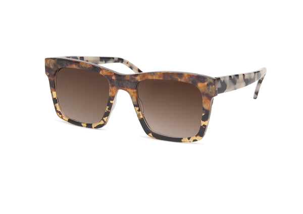 MILAN - Amber Tortoiseshell. The glasses are an oversized square frame with subtly accentuated tips and a narrow bridge. These are perfect for all face shapes and sizes. These glasses are lovingly handcrafted in Italy these frames are cut from blocks of acetate developed exclusively for PRISM 5-barrel hand-drilled hinges Carl Zeiss lenses.