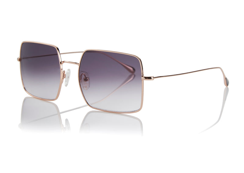 MONTREAL - Rose Gold. A contemporary interpretation of a graphic oversized style, featuring softly squared edges. Lightweight stainless steel frames are finished in pink gold. They feature adjustable stylish titanium pink-gold nose pads, for comfortability.